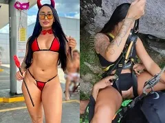 Naughty woman fucking an abseiling instructor in the middle of a cliff