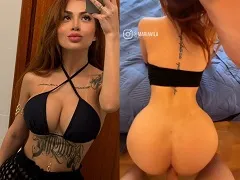 Mari Ávila on all fours on the bed taking a cock session