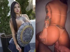 Giving her ass while lying on her back