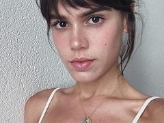 A 28-year-old global actress, in a super-hot sex scene in the series “Os dias eram assim” showing her breasts