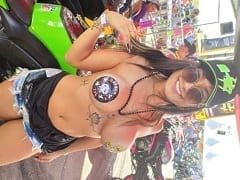 Amateur hotties with their breasts out showing off half-naked at a motorcycle meeting and the crowd filmed it