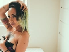 Naughty CamGirl Inanna Playing With a Lollipop Stuck in Her Pussy and Ass While Filming