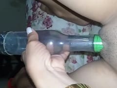 Wonderful Nymphet with Shaved Pussy Masturbates With an Empty Bottle of Syn Ice and Records a Video Show – Amateur