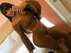 Spotted brunette who is a luxury escort recorded a video of her rolling around half-naked, horny.