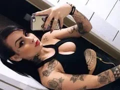 Young tattooed girl giving a nice real cumshot