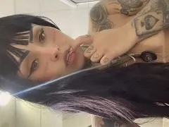 Naked showing off her tits and pussy