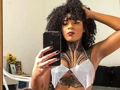 Showing off her plump pussy and tasty tits