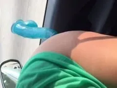 Very hot brunette wife put a dildo stuck in the car window and penetrated her vagina on the highway while her husband was driving – Amadora